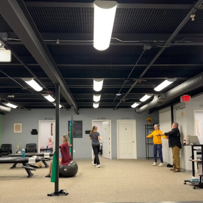 Open rehab space inside chiropractic clinic.